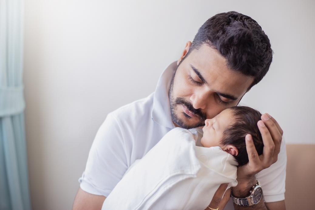 Father holding baby