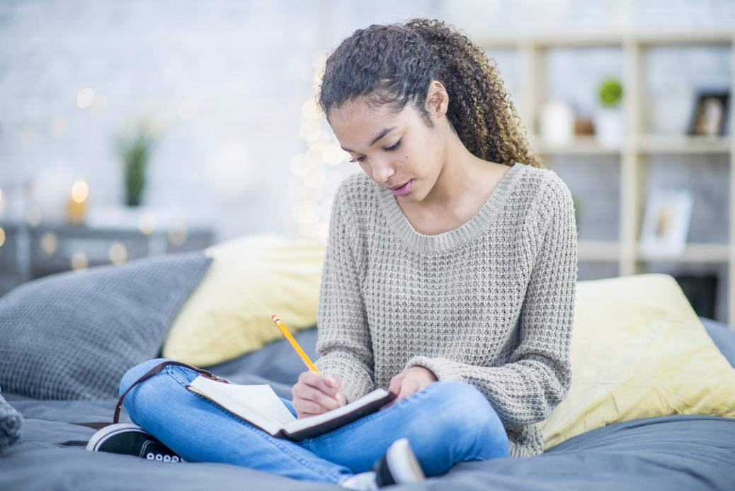 Young lady journaling