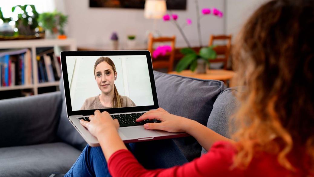 Woman having a virtual session from home