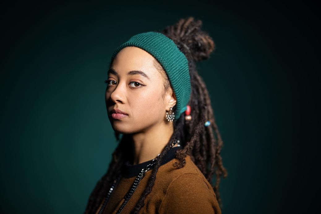 A young African American woman with blank expression 