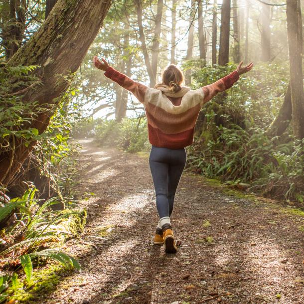 Person enjoying a walk in nature