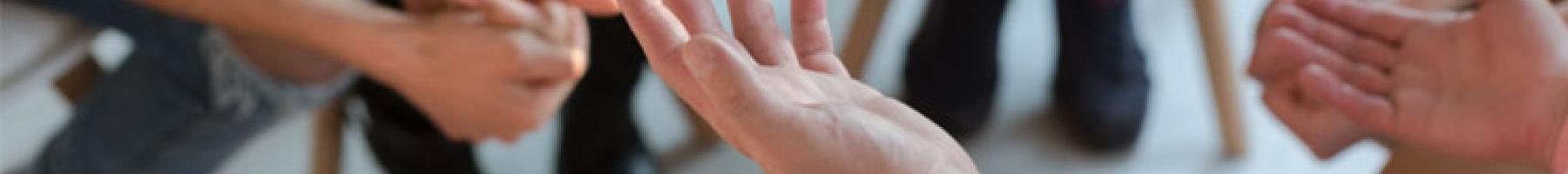 Integrating Mentalizing and DBT Borderline Personality DIsorder Group of hands