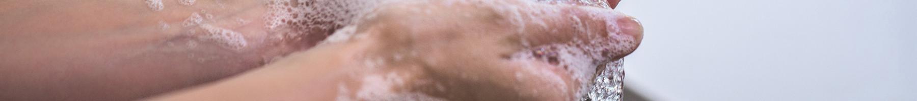 person washing hands