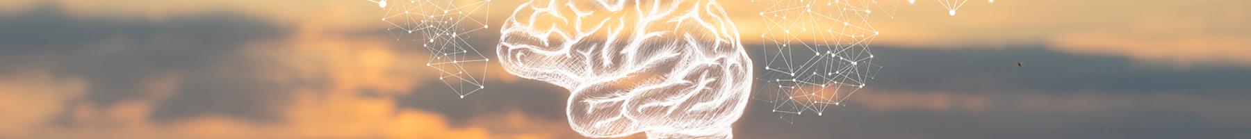 A hand holding a graphic image of a brain A hand holding a graphic image of a brain