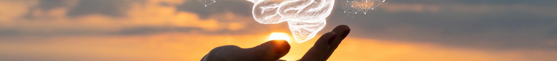 Client-Oriented Research Panel: Leveraging Lived Expertise to Bring Research to the Next Level Hand holding an electronic image of a brain
