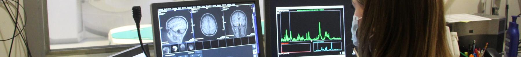 Researcher comparing the structure and function of the brain in individuals who have suicidal thoughts