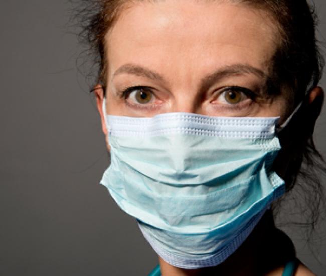 Health care worker wearing medical mask