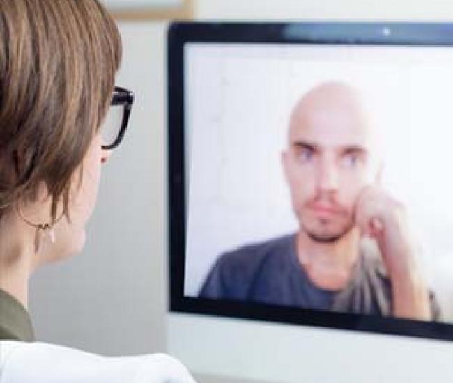 Healthcare worker using telemedicine