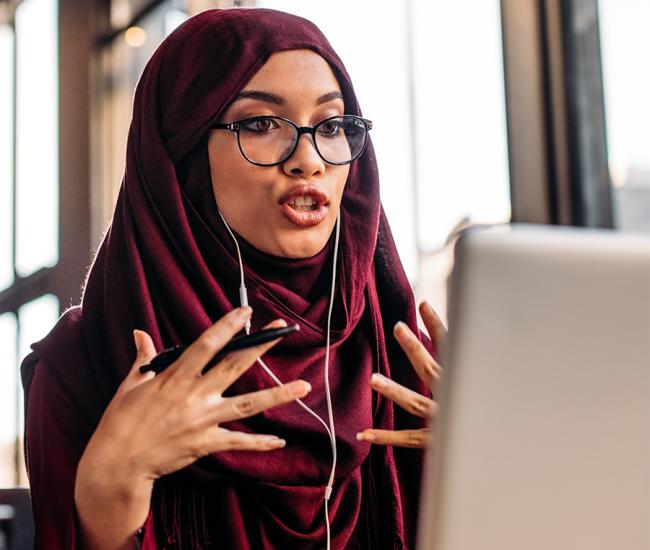 Woman conversing on a virtual appointment