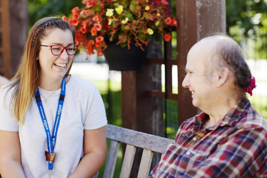 Staff member having a conversation with patient