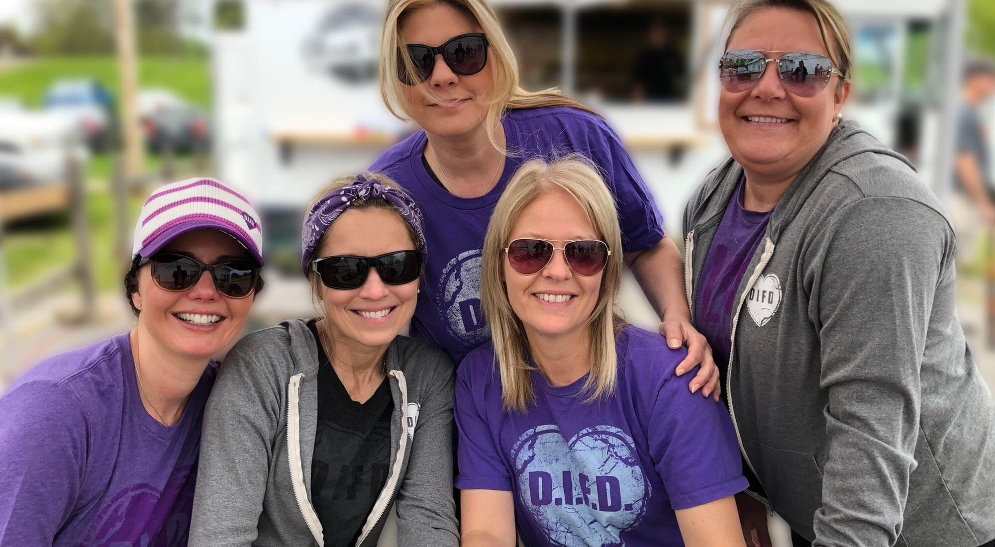 A group of people wearing t-shirts and sweaters for D.I.F.D.